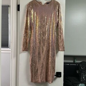 Super cute pink sequined knee length dress!
